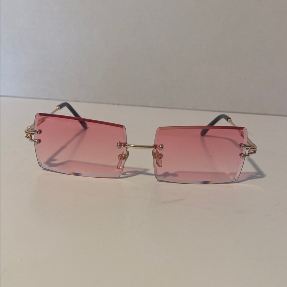 Pink and Gold Rimless Sunglasses with Retro Charm